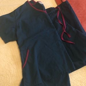 Deep turquoise colored scrub set